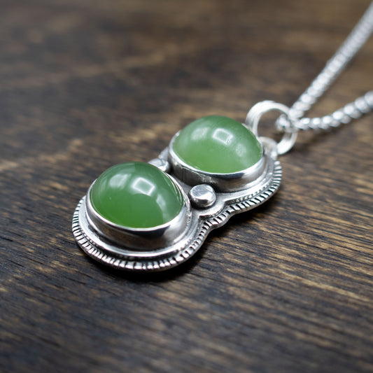 green jade and sterling silver pendant