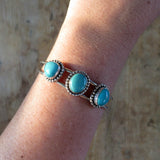 Fox turquoise and sterling silver cuff bracelet on arm