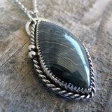 Blue petrified bog wood pendant