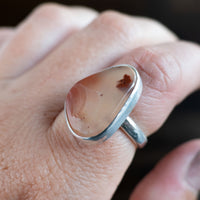 Utah Agate and sterling silver ring on hand