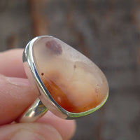Utah Agate and sterling silver ring in hand