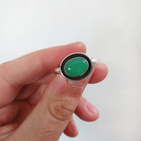 Size 9 Chrysoprase and sterling silver shadowbox ring in hand